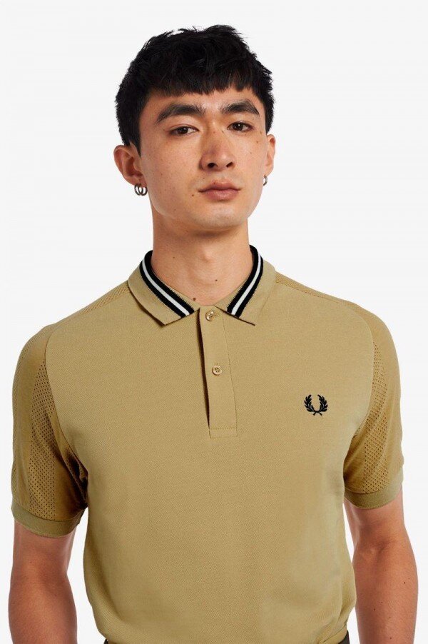 Polos con mangas raglán Polos con mangas raglán