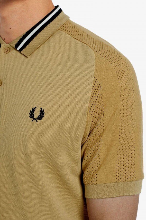 Polos con mangas raglán Polos con mangas raglán