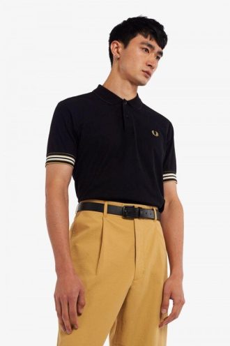Polos con puños a rayas