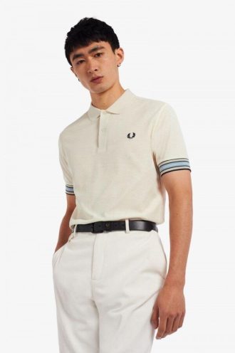 Polos con puños a rayas