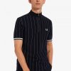 Polos de cuello alto con rayas finas