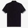 Polos de cuello alto con rayas finas