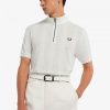 Polos de manga raglán con cuello y cremallera Polos de manga raglán con cuello y cremallera