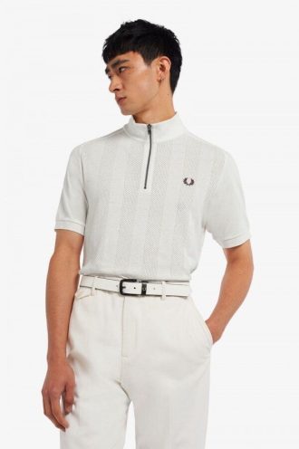 Polos de manga raglán con cuello y cremallera
