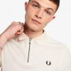 Polos de toalla con cuello con cremallera