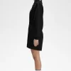 Vestido de mujer con mono y cremallera Vestido de mujer con mono y cremallera